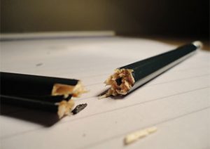 black pencil broken in two